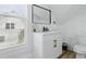 Bright bathroom features a modern vanity, rectangular mirror, and sleek fixtures providing a stylish and functional space at 1321 Union St, Indianapolis, IN 46225