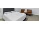 Bright bedroom showcases a bed and futon with carpet flooring at 1321 Union St, Indianapolis, IN 46225