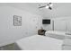Bright bedroom showcases two beds, a television and carpet flooring at 1321 Union St, Indianapolis, IN 46225