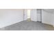 Bedroom with walk-in closet, neutral carpet, and white trim at 1321 Union St, Indianapolis, IN 46225