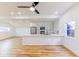 Modern kitchen featuring new stainless steel appliances, a peninsula island, and hardwood floors at 1321 Union St, Indianapolis, IN 46225