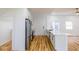 The beautifully updated kitchen features a large island, sleek stainless steel appliances, and modern cabinetry at 1321 Union St, Indianapolis, IN 46225
