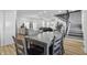 Open-concept living space with kitchen, dining area, living room, and staircase at 1321 Union St, Indianapolis, IN 46225