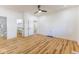 A primary bedroom featuring an ensuite bath, luxury vinyl floors, and a walk-in closet at 1321 Union St, Indianapolis, IN 46225