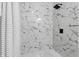 Beautiful bathroom shower features sleek, marble-like walls and contrasting fixtures at 1321 Union St, Indianapolis, IN 46225