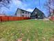 Large backyard with a privacy fence, perfect for outdoor activities and entertaining at 1360 N Dearborn St, Indianapolis, IN 46201