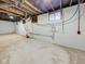 Unfinished basement offering ample storage and potential for customization at 1360 N Dearborn St, Indianapolis, IN 46201
