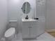 Clean, renovated bathroom with a modern sink and mirror at 1360 N Dearborn St, Indianapolis, IN 46201