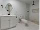 Bright, newly renovated bathroom with modern vanity and glass enclosed shower at 1360 N Dearborn St, Indianapolis, IN 46201