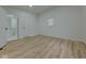 This bedroom is bright with hardwood floors, white walls, and one window at 1360 N Dearborn St, Indianapolis, IN 46201