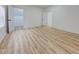 Spacious bedroom featuring new wood flooring and neutral color palette at 1360 N Dearborn St, Indianapolis, IN 46201