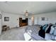 Large main bedroom featuring a ceiling fan, a wooden entertainment center and a comfortable bed at 1380 Delacorte Cir, Shelbyville, IN 46176