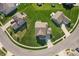 Aerial shot of a home with a well-maintained lawn nestled in a suburban neighborhood at 145 Stamford Dr, Pittsboro, IN 46167