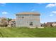 Expansive backyard featuring green grass and a storage shed at 145 Stamford Dr, Pittsboro, IN 46167