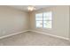 Bedroom with a ceiling fan and a window with a view of the property's surroundings at 145 Stamford Dr, Pittsboro, IN 46167