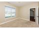 Neutral bedroom with a window allowing natural light at 145 Stamford Dr, Pittsboro, IN 46167