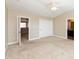 A view of a main bedroom with a closet and an open bathroom on the side at 145 Stamford Dr, Pittsboro, IN 46167