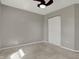 Cozy bedroom showcasing neutral walls, carpet, and a closet offering storage space at 14917 Mia Dr, Carmel, IN 46033