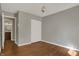 Bedroom featuring hardwood flooring, double door closet and a view of the bathroom at 14917 Mia Dr, Carmel, IN 46033