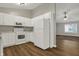 Bright eat-in kitchen features white cabinets and opens to a living room at 14917 Mia Dr, Carmel, IN 46033