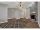 Open concept living room showcasing brick fireplace, hard surface floors, and neutral wall paint at 14917 Mia Dr, Carmel, IN 46033