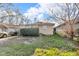 Cozy one-story home featuring vinyl siding and a quaint covered porch at 1504 S Lynhurst Dr, Indianapolis, IN 46241