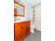 Bathroom featuring a bath with shower, modern sink, and wood vanity at 1737 W 200 N, Greenfield, IN 46140