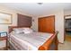 Bedroom featuring a sleigh bed, hardwood closet, and neutral décor at 1737 W 200 N, Greenfield, IN 46140