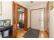 Inviting entryway with wood floors and a view into the adjacent living space at 1737 W 200 N, Greenfield, IN 46140