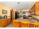 Spacious kitchen with wooden cabinets, granite countertops, and stainless steel appliances at 1737 W 200 N, Greenfield, IN 46140