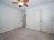 This bedroom features plush carpeting, closet with double doors, and neutral white walls at 182 Batteese Dr, Cicero, IN 46034