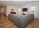 Spacious living room featuring a large sectional sofa, natural light, and modern decor at 182 Batteese Dr, Cicero, IN 46034