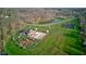 Gorgeous aerial view showing a pond and the tennis and basketball courts in this community at 1950 Midnight Pass, Brownsburg, IN 46112
