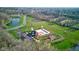 Gorgeous aerial view showing a pond and the tennis and basketball courts in this community at 1950 Midnight Pass, Brownsburg, IN 46112