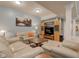 Comfortable finished basement features a lounge area with entertainment center at 1950 Midnight Pass, Brownsburg, IN 46112