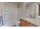Clean bathroom with bathtub and shower combo and granite vanity at 1950 Midnight Pass, Brownsburg, IN 46112
