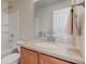 Bathroom featuring a bathtub with shower and vanity with mirror at 1950 Midnight Pass, Brownsburg, IN 46112