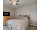 Cozy bedroom with carpet flooring, ceiling fan, and natural light from window at 1950 Midnight Pass, Brownsburg, IN 46112