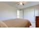 Bedroom featuring neutral walls, carpeted floors, a closet and a ceiling fan at 1950 Midnight Pass, Brownsburg, IN 46112