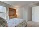 Bright bedroom featuring closet and a large window at 1950 Midnight Pass, Brownsburg, IN 46112