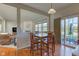 Open concept dining area seamlessly flows into the living room, enhancing the sense of space at 1950 Midnight Pass, Brownsburg, IN 46112