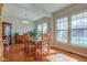 Bright dining room with hardwood floors, natural light, and traditional furnishings at 1950 Midnight Pass, Brownsburg, IN 46112