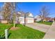 A long driveway leads to a spacious garage and a basketball hoop for outdoor fun at 1950 Midnight Pass, Brownsburg, IN 46112