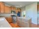 Functional kitchen featuring a large island, modern stainless steel appliances, and ample cabinet space at 1950 Midnight Pass, Brownsburg, IN 46112