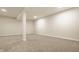 Unfinished basement with neutral carpet and recessed lighting, offering flexible space for customization and storage at 2023 Alvord St, Indianapolis, IN 46202