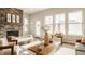 Inviting living room with a cozy fireplace and an abundance of natural light at 2023 Alvord St, Indianapolis, IN 46202