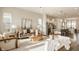 Open-concept living room and kitchen with plenty of natural light and modern finishes at 2023 Alvord St, Indianapolis, IN 46202