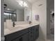 Bright bathroom with double vanity, modern fixtures, and a sleek glass-enclosed shower at 20398 N Pacific Ave, Westfield, IN 46074