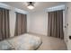 Bright bedroom with carpet, curtains, and ample natural light at 20398 N Pacific Ave, Westfield, IN 46074