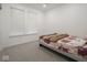 Cozy bedroom featuring a bed, carpeted floor, and natural light at 20398 N Pacific Ave, Westfield, IN 46074